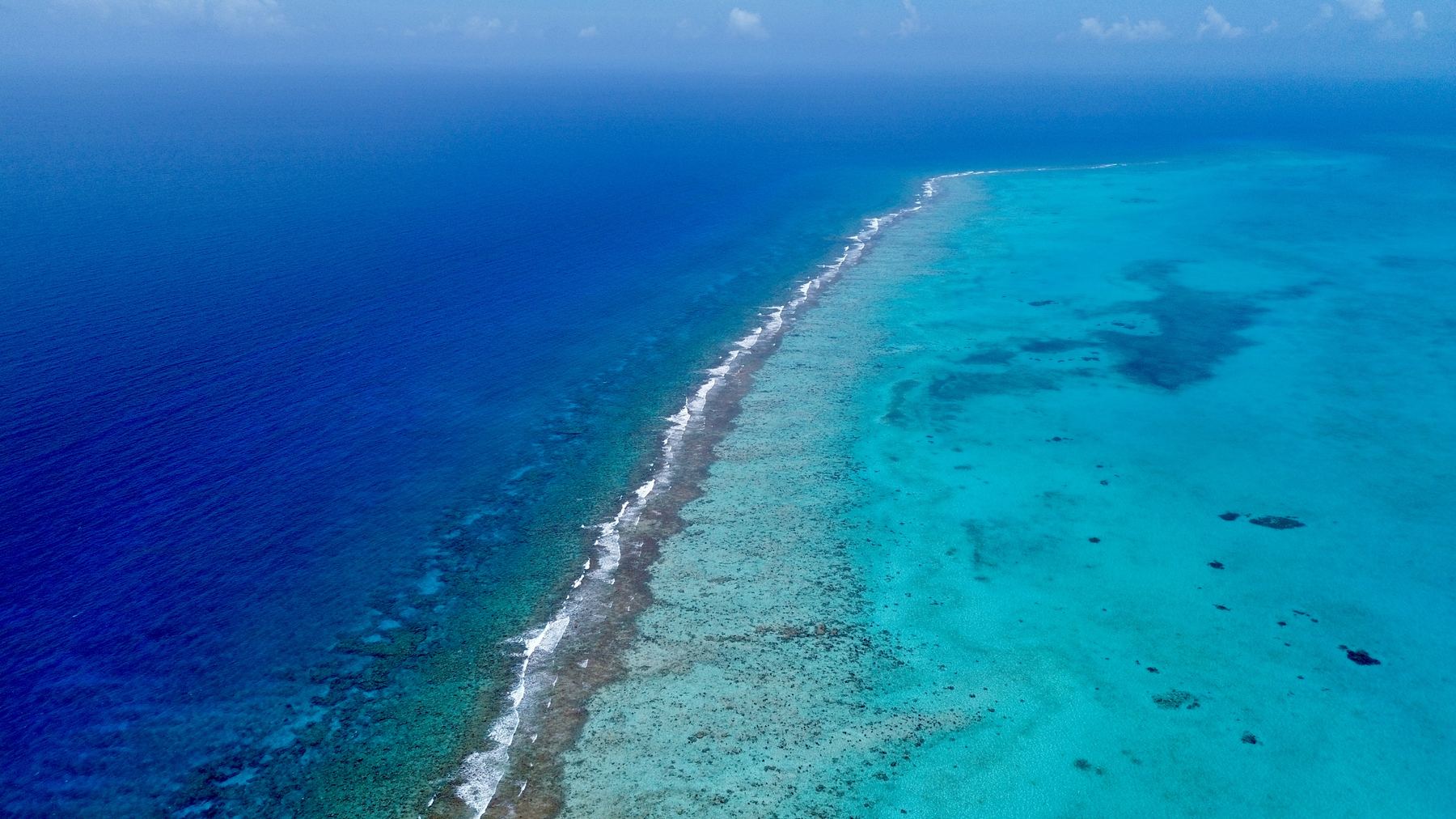 Aerial view of a turquoise reef